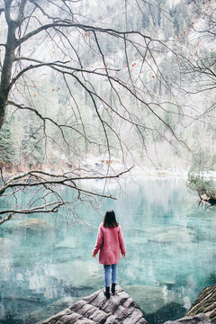 Young woman at Blausee lake