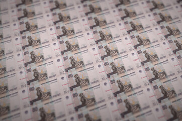 50 russian rubles bills printed in illegal money production conveyor. Collage of many fake bills....