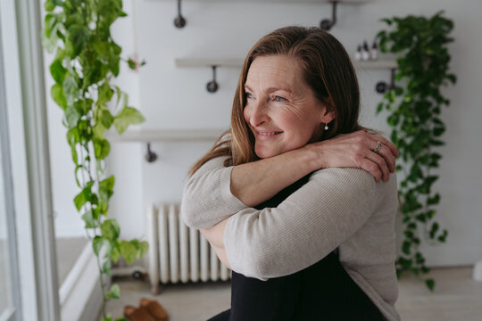 Mature woman portrait at home
