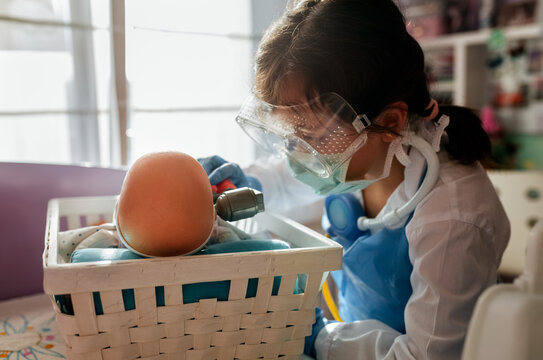 Little girl playing at home