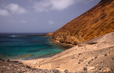 Spectacular Montana Amarilla, Yellow Mountain, in different colors of volcanic rock on La Graciosa, Canary Islands