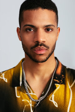 Young urban man looking at camera