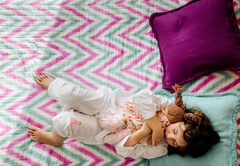 Little girl sleeping in the bedroom