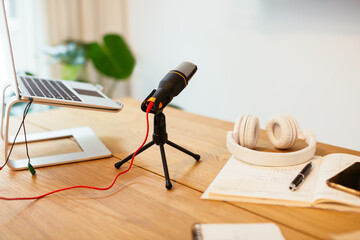 Podcast recording equipment on table in office