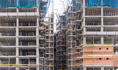 Building under construction with scaffolding