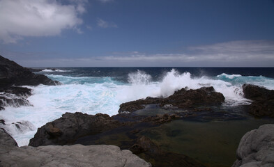 Fototapeta na wymiar Gran Canaria, north coast, powerful ocean waves brought by winter wind storm 