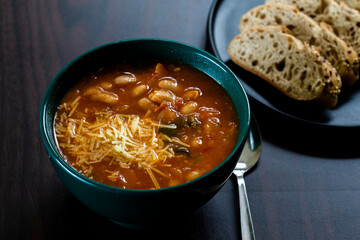 Homemade Ribollita, tuscan bean soup with light rye ciabatta