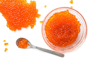 Red caviar in glassware with spoon isolate on white background
