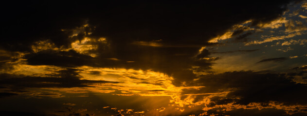 Beautiful late afternoon sky with intense colors in a romantic format