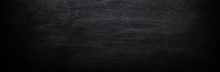 Dark, grunge and scratched chalkboard texture may used as background