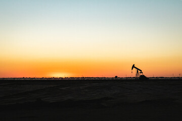 oil pump silhouette at sunset
