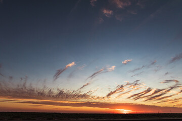 dramatic sunset by the valley