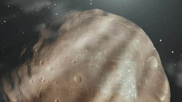 Orbiting the Moon Called Phobos, the Larger of the Two Natural Satellites of Mars. Elements of this Video furnished by NASA. 