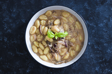 plant-based food, vegan mushroom gnocchi with dairy-free mushroom sauce ance basil