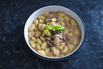 plant-based food, vegan mushroom gnocchi with dairy-free mushroom sauce ance basil