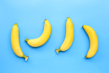 Bananas on blue background. Top view