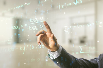 Man hand working with abstract scientific formula hologram on blurred office background....