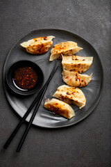 Gyoza Potsticker Dumplings with Chopsticks
