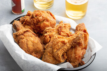 Southern Fried Chicken w/ Beer Glasses and Hot Sauce Horizontal