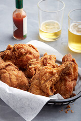 Southern Fried Chicken w/ Beer Glasses and Hot Sauce