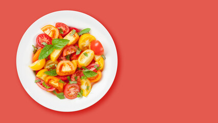 Fresh colorful tomatoes and basil salad