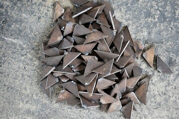 metallic pieces in the fabrication workshop. 
