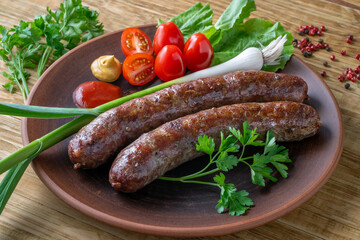Food poster, restaurant setting - a portion of grilled sausages with tomatoes and herbs, ketchup, mustard. On a rustic table.
