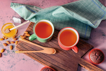 Composition with hot tea on table