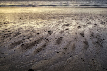 reflets du soleil sur le sable