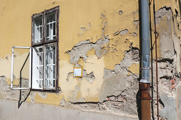 Wall and window of an old ruined building