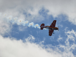Fototapeta na wymiar Pilot performances of Yak piston aircraft at the air show