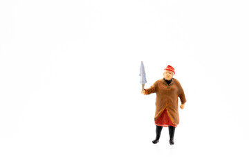 Miniature people standing on white background and copy space for your text 