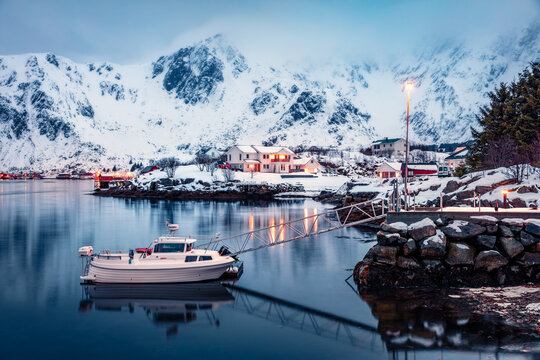 Dramatic evening view of Ballstad port, Norway, Europe. Picturesque spring scene of Lofoten Islands. Calm seascape of Norwegian sea. Traveling concept background.  Life over polar circle..
