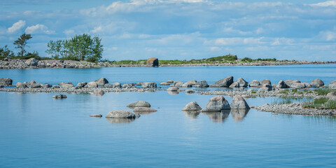 Wild rocky coastline of the Baltic sea in summer. The Gulf of Finland, Estonia.