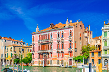 Fototapeta na wymiar Palazzo Fontana Rezzonico palace building in Cannaregio sestiere from Grand Canal waterway in Venice historical city centre, blue clear sky background in summer day, Veneto Region, Italy