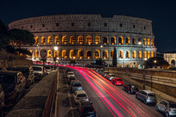 Fototapeta na wymiar colosseum at night Rome Italy with long exposure lights