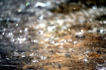 Dripping water on surface in the rain