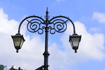 Fototapeta na wymiar street lamp on blue sky