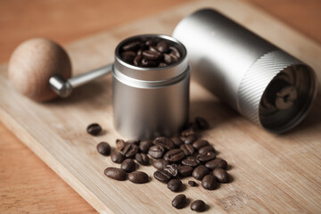 Manual coffee grinder and roasted coffee beans