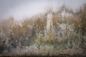 Old concrete wall  surface that the paint has dropped and is very dirty with vignett