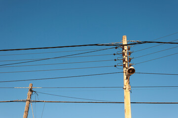 Two old light wiring poles