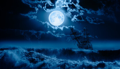 Old Sailing-ship in storm sea, Night sky with moon in the clouds in the background 