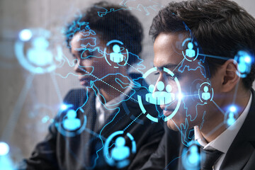 Two good looking businesspeople working on social network security project. Multiexposure. Hologram.