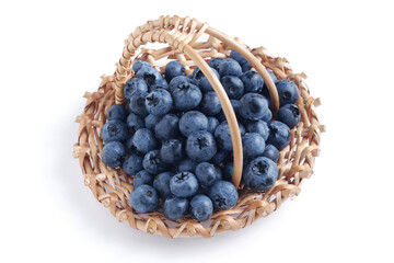 Fototapeta na wymiar Freshly picked blueberries in basket