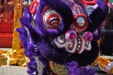 Colorful traditional Chinese Lion dance costumes often used in performances to celebrate Chinese...