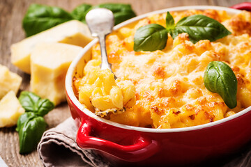 Mac and cheese, american style macaroni pasta in cheesy sauce