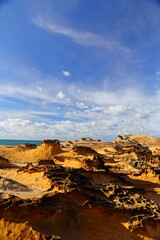 Fototapeta na wymiar Natural rock formation at Yehliu Geopark, one of most famous wonders in Wanli, New Taipei City, Taiwan.