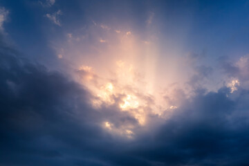 The cloud in rain season with sunlight.