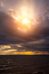 Seascape and clouds in rain season with sunlight.