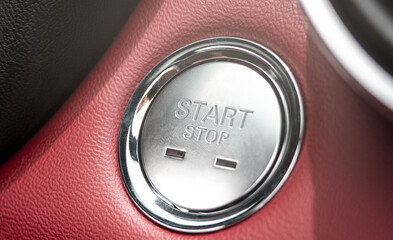 The button to start the engine of a car.